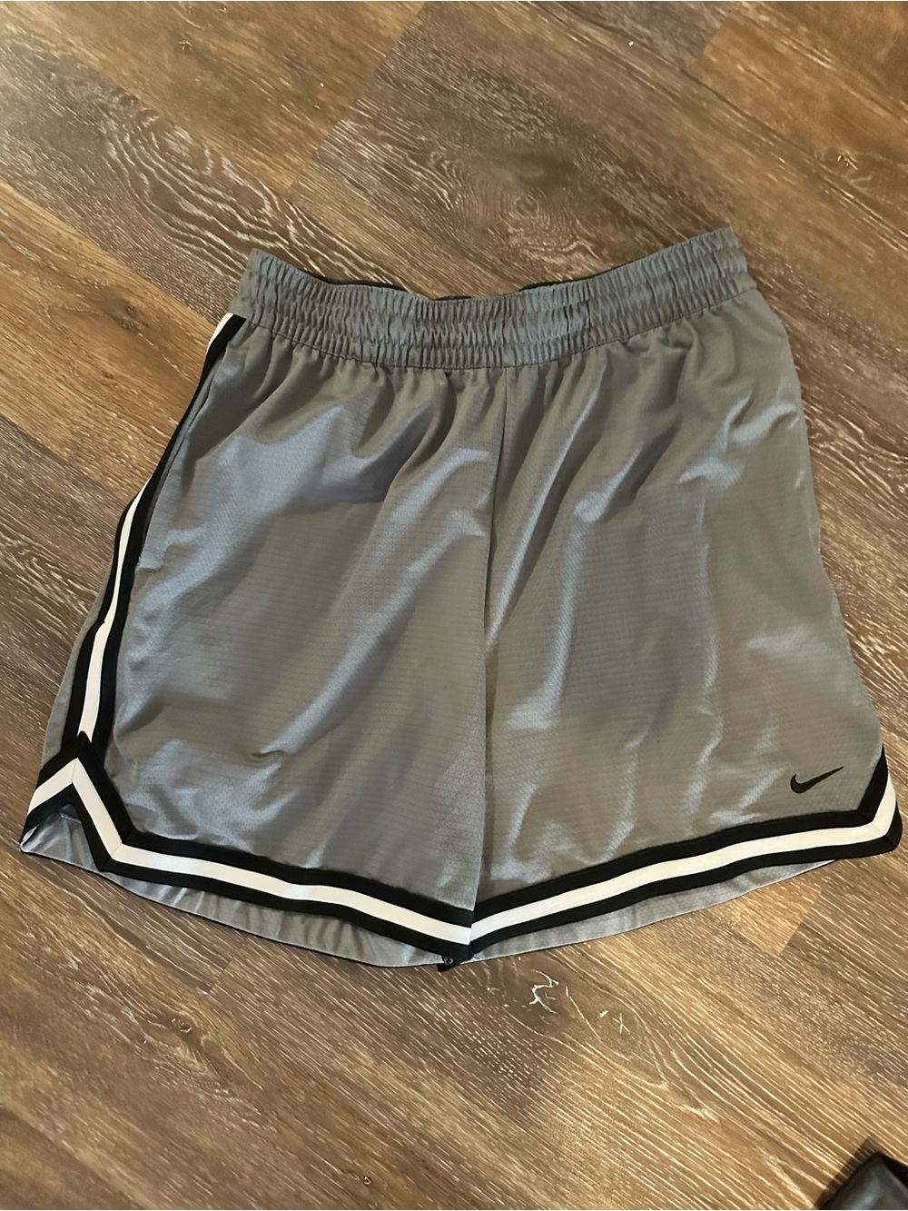 Nike Women's Gray Athletic Shorts with Black and White Trim
